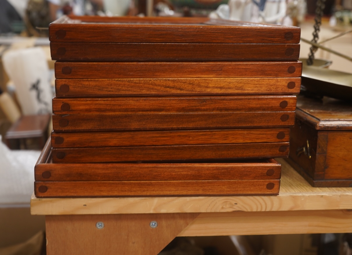 A collection of five small portable wooden and glass jewellery display cases. 4cm high x 40.5cm wide x 28cm deep. Condition - good